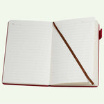 Open notebook with red binding on a white background