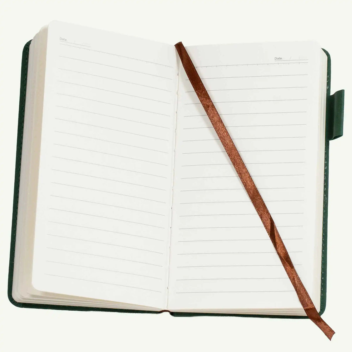 Open green A6 suede notebook showing lined 100gsm pages